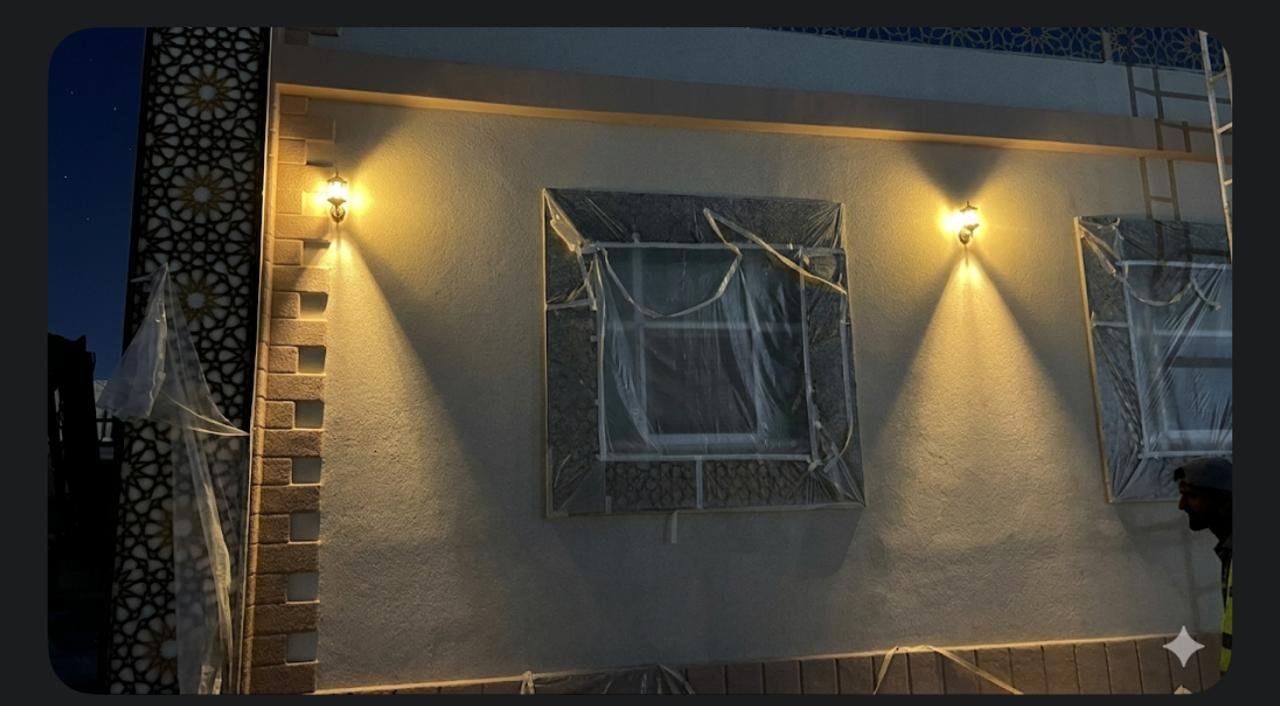 Villa insulated window mouldings with sconce illumination